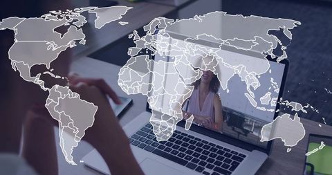 Global remote collaboration on laptop with world map overlay for virtual meetings