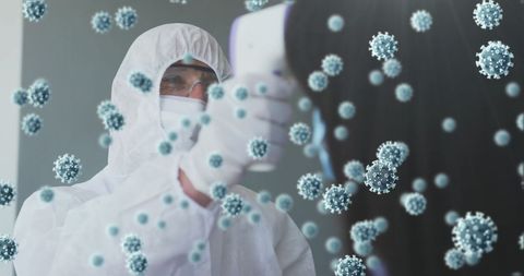 Health professional measuring temperature amidst floating covid-19 cells