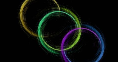 Vibrant Multicolor Light Trails in Circular Motion on Black Background