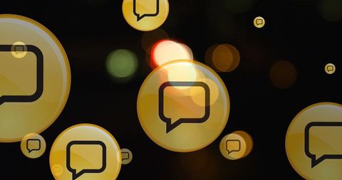 Abstract Speech Bubbles Floating in Blur with Nighttime City Lights