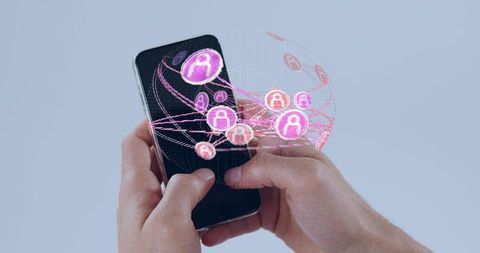 Adult hands holding smartphone projecting holographic social network globe of avatar icons