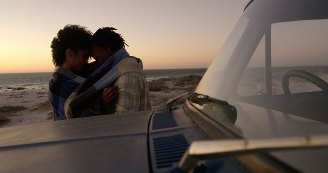 Romantic Couple Embracing on Beach at Sunset Near Pickup Truck - Download Free Stock Images Pikwizard.com
