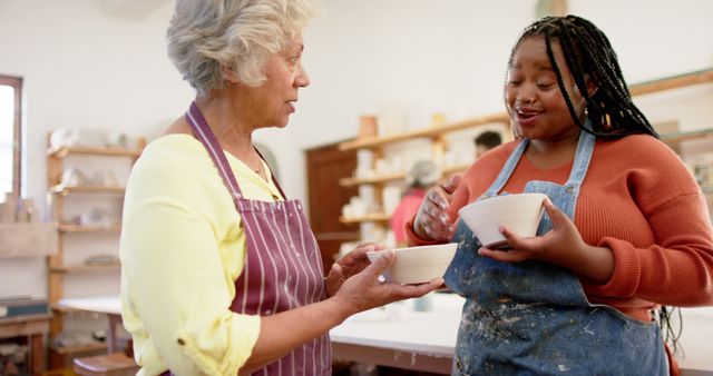 Smiling Multigenerational Women Enjoying Pottery Workshop Together - Download Free Stock Images Pikwizard.com