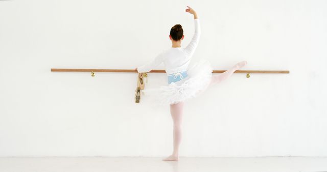 Ballet Dancer Stretching at Barre in White Studio - Download Free Stock Images Pikwizard.com