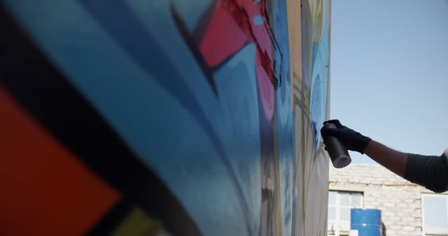 Close-up of Street Artist Creating Colorful Graffiti on Wall - Download Free Stock Images Pikwizard.com