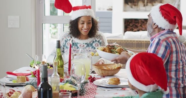 Family Enjoying Christmas Dinner Wearing Santa Hats - Download Free Stock Images Pikwizard.com