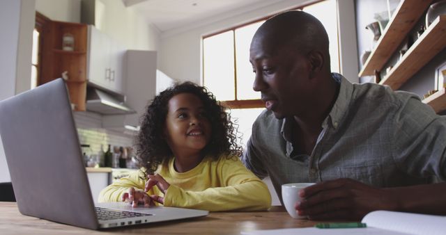 Father Teaching Young Daughter on Laptop at Home - Download Free Stock Images Pikwizard.com