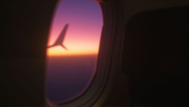 Scenic Sunset Horizon from Airplane Window Seat