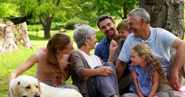 Happy Multigenerational Family Outdoor Picnic with Pet Dog - Download Free Stock Images Pikwizard.com