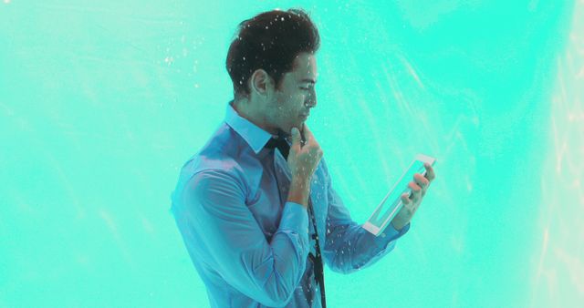 Businessman Working Underwater with Digital Tablet - Download Free Stock Images Pikwizard.com