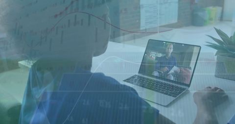 Business colleagues video conferencing with graphs overlay