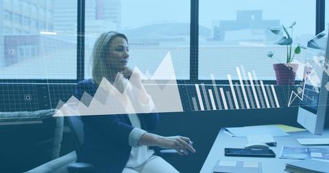 Businesswoman Analyzing Digital Data with Holographic Interface - Download Free Stock Images Pikwizard.com