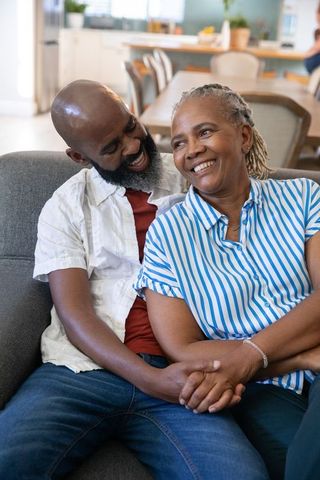 Senior African American Couple Enjoying Cozy Home Time Together