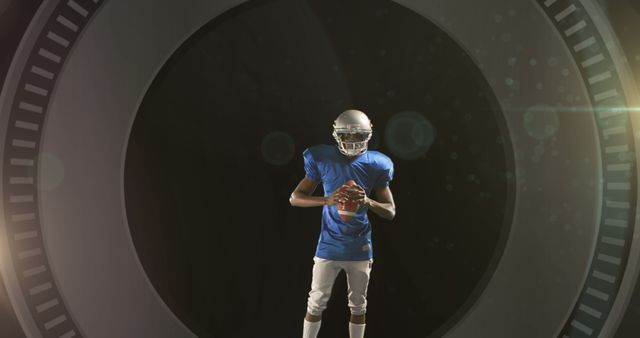 American Football Player Holding Ball in Spotlight with Dramatic Background - Download Free Stock Images Pikwizard.com