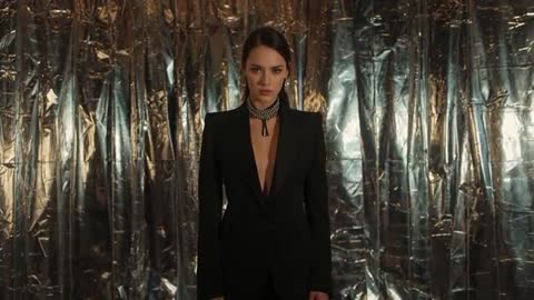 Elegant Woman in Dark Suit with Rhinestone Choker