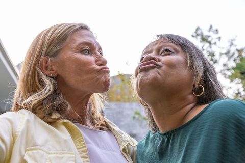 Diverse Friends Enjoying Playfulness Outdoors