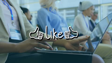 Diverse Professionals Engaging with Laptops in Seminar Setting