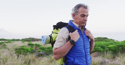 Senior Adventurer Hiking Through Mountainous Terrain - Download Free Stock Images Pikwizard.com