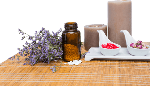 Transparent aromatherapy setup with flowers and candles