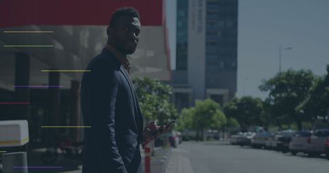 African American Businessman Engages with Social Media in Urban Environment - Download Free Stock Images Pikwizard.com