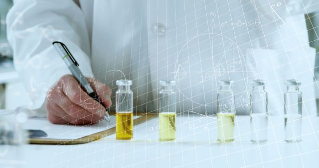 Image of mathematical equations on caucasian male scientist holding a vial bottle at laboratory - Download Free Stock Photos Pikwizard.com