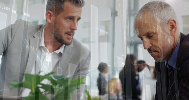 Two business partners are engaged in discussion about financial strategy, with financial data analytics overlay visible. They are wearing professional attire, reflecting a corporate environment. Suitable for use in articles about business partnerships, financial planning, data-driven decision making, or corporate teamwork.