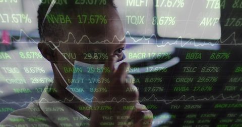 Businesswoman Analyzing Financial Data with Face Mask in Office - Download Free Stock Images Pikwizard.com