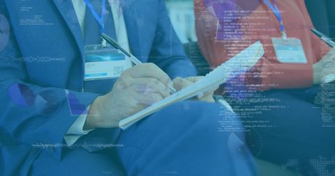 Business Professional Taking Notes with Data Overlay - Download Free Stock Images Pikwizard.com