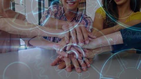 Diverse Team Hand Unity with Digital Gear Network Overlay
