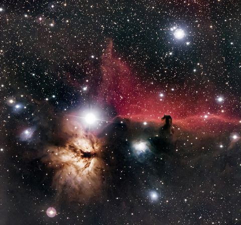 Horsehead nebula with surrounding stars and universe cosmic clouds