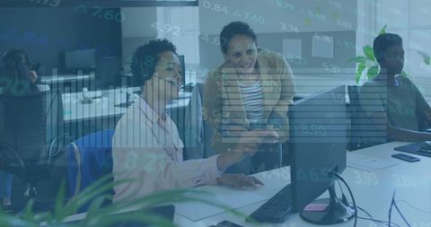 diverse businesswomen analyzing market trends in modern office - Download Free Stock Images Pikwizard.com