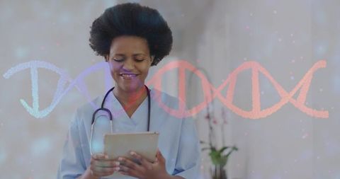 Smiling clinician holding tablet with dna overlay for genomics and healthcare technology
