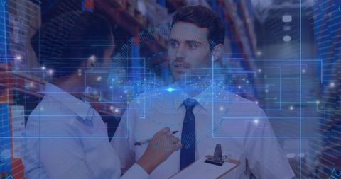 Warehouse managers inspecting inventory with digital HUD overlay for smart logistics