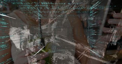 Woman Developer Multitasking on Laptop with Digital Code Overlay