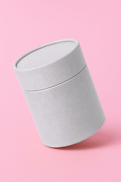 Minimalist Grey Cardboard Container on Pastel Pink Background