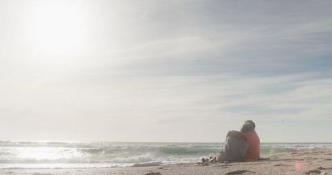 Senior Couple Embracing on Serene Beach at Sunset - Download Free Stock Images Pikwizard.com