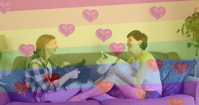 Image of heart emojis and rainbow flag over caucasian female couple with dogs. Lgbtq, love, romance and celebration concept digitally generated image.