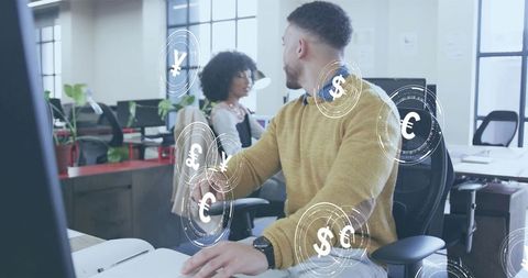 Consulting colleagues analyzing currency hud and data visualization in modern workspace