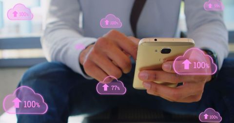 Person Utilizing Smartphone with Futuristic Cloud Uploads Concept