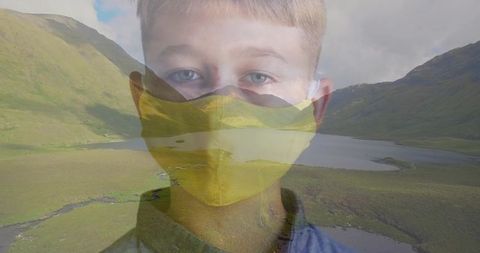 Environmental Connection: Boy Portrait Merging with Mountain Lake Scenery