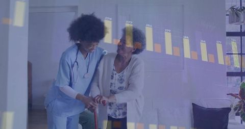 Smiling nurse assisting elderly woman with walking supportive care