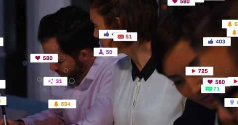 Business team monitoring social media engagement with real-time notification overlays