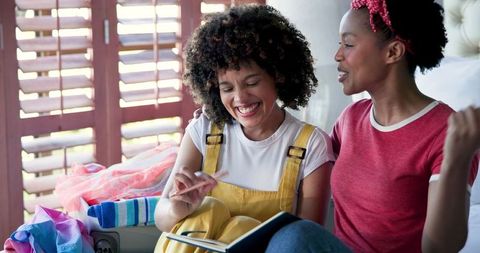 Joyful Friends Laughing and Bonding at Home