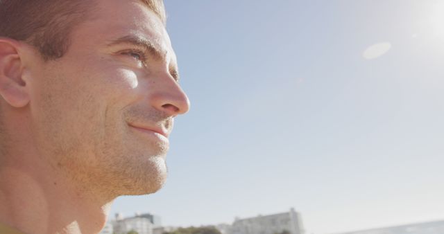 Smiling Man Enjoying Bright Sunny Day Outdoors - Download Free Stock Images Pikwizard.com