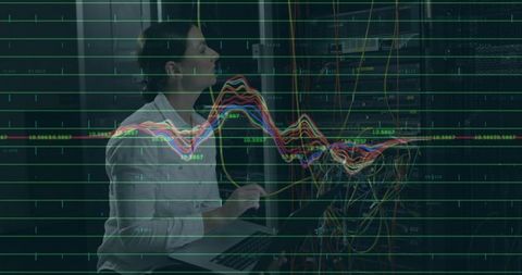 Technician adjusting network cables in server room with data overlay