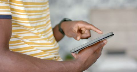 Person Engaged with Tablet for Mobile Innovation at Home