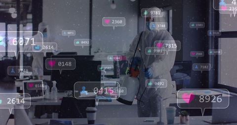 Disinfecting professional in open office with social media engagement