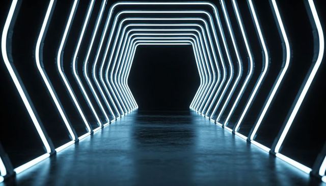 Glowing Hexagonal Neon Tunnel Leading to Dark Vanishing Point for Futuristic Design Concepts