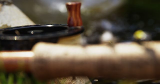 Fishing Rod and Reel in Nature with Blurred Background - Download Free Stock Images Pikwizard.com