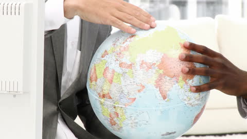 Global Business Collaboration Concept Hands on Globe